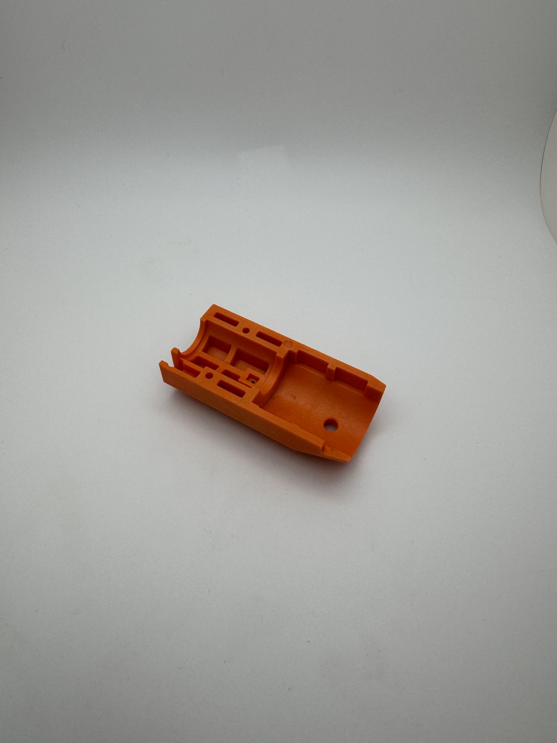 1013746, Rev C,Muzzle Brake,Left, ORANGE